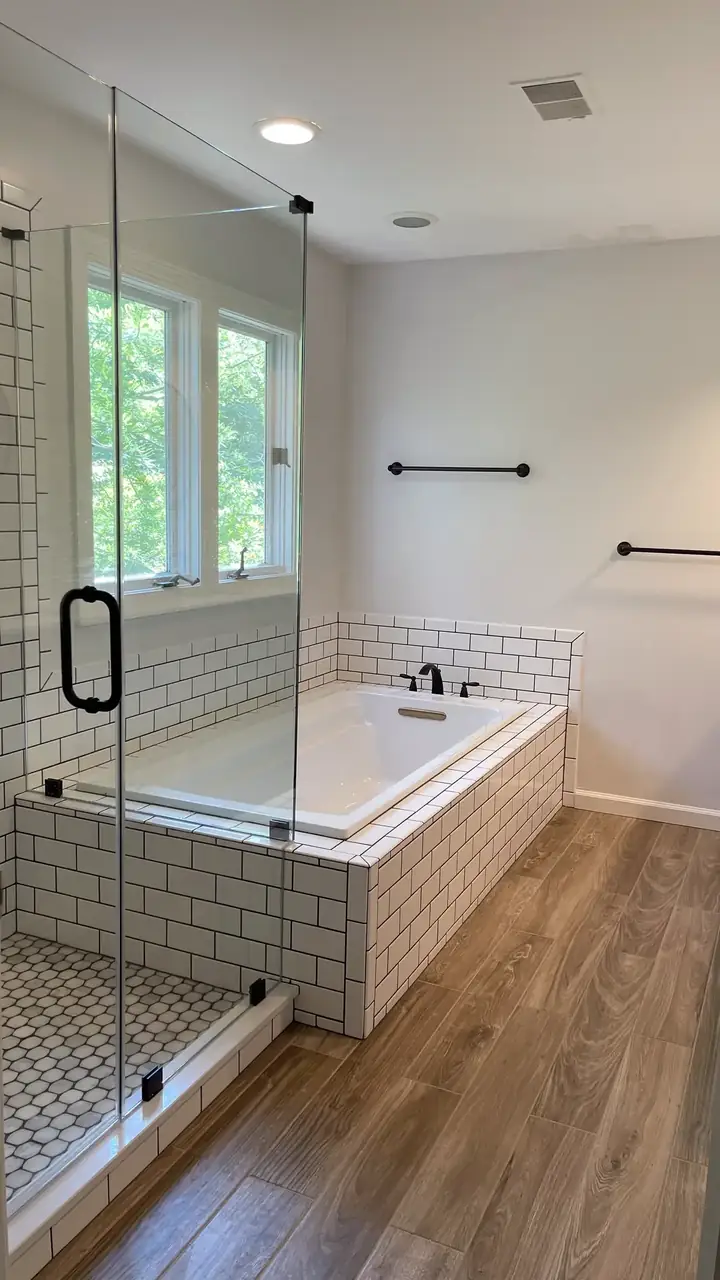 Newly remodeled bathroom with tiled walk-in shower
